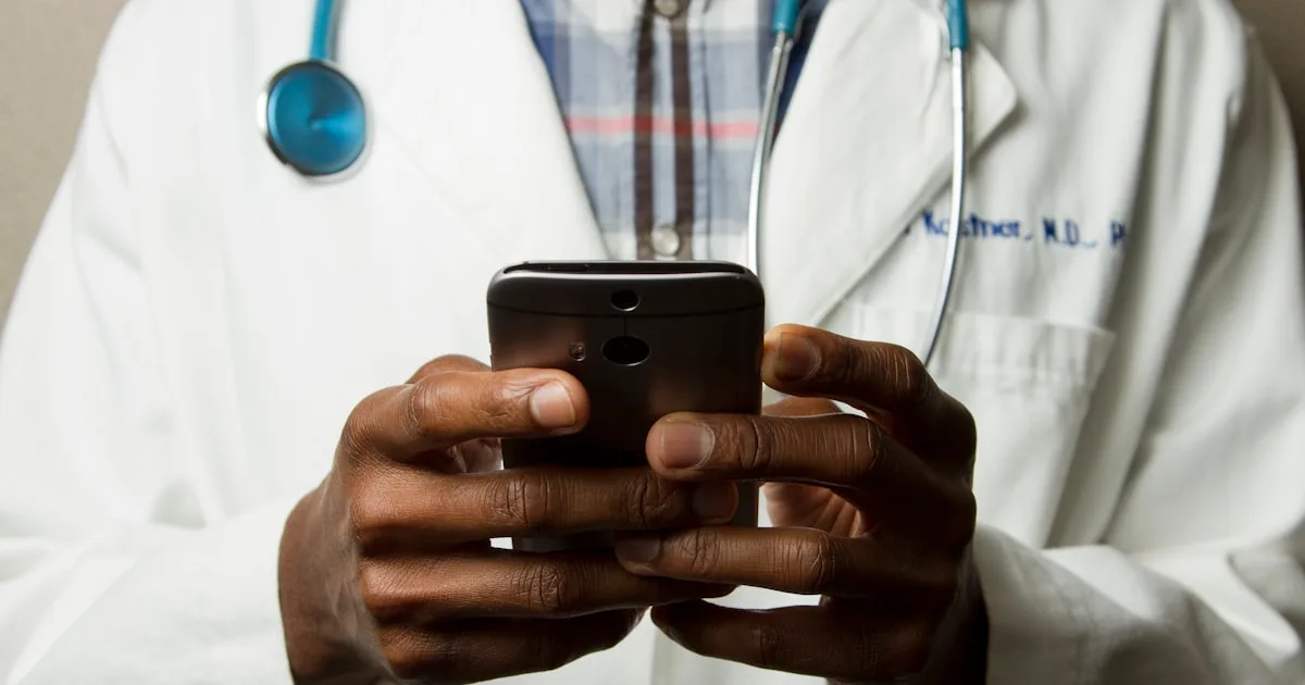 Clinician working on a secured workstation with patient records