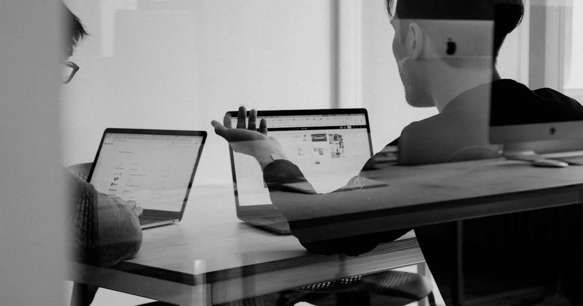 Company intranet homepage open on a widescreen monitor