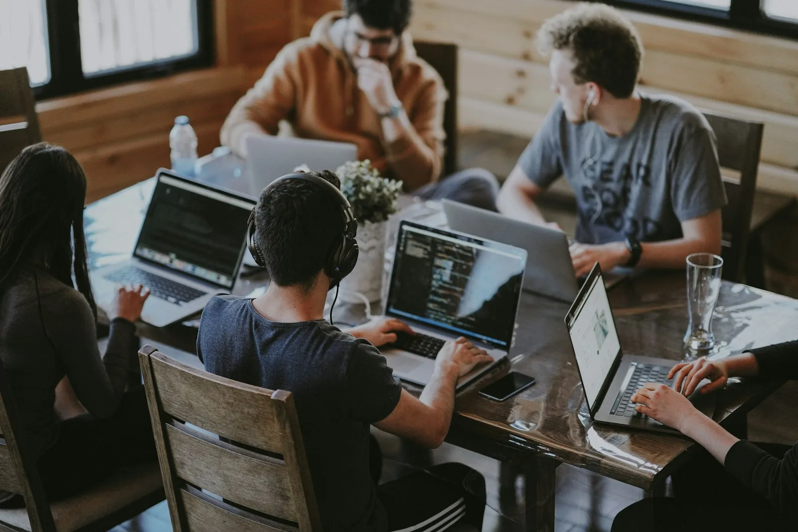Growing team collaborating across a modern Dubai office workspace